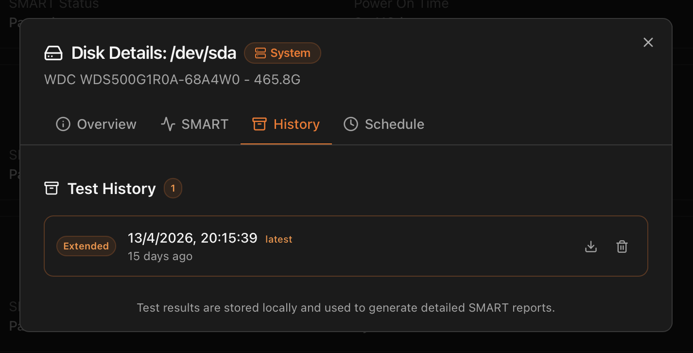 Disk drill-in modal — History tab listing past SMART tests with download and delete actions